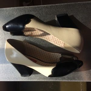 b.a.i.t. footwear ivory & black peep-toe heels